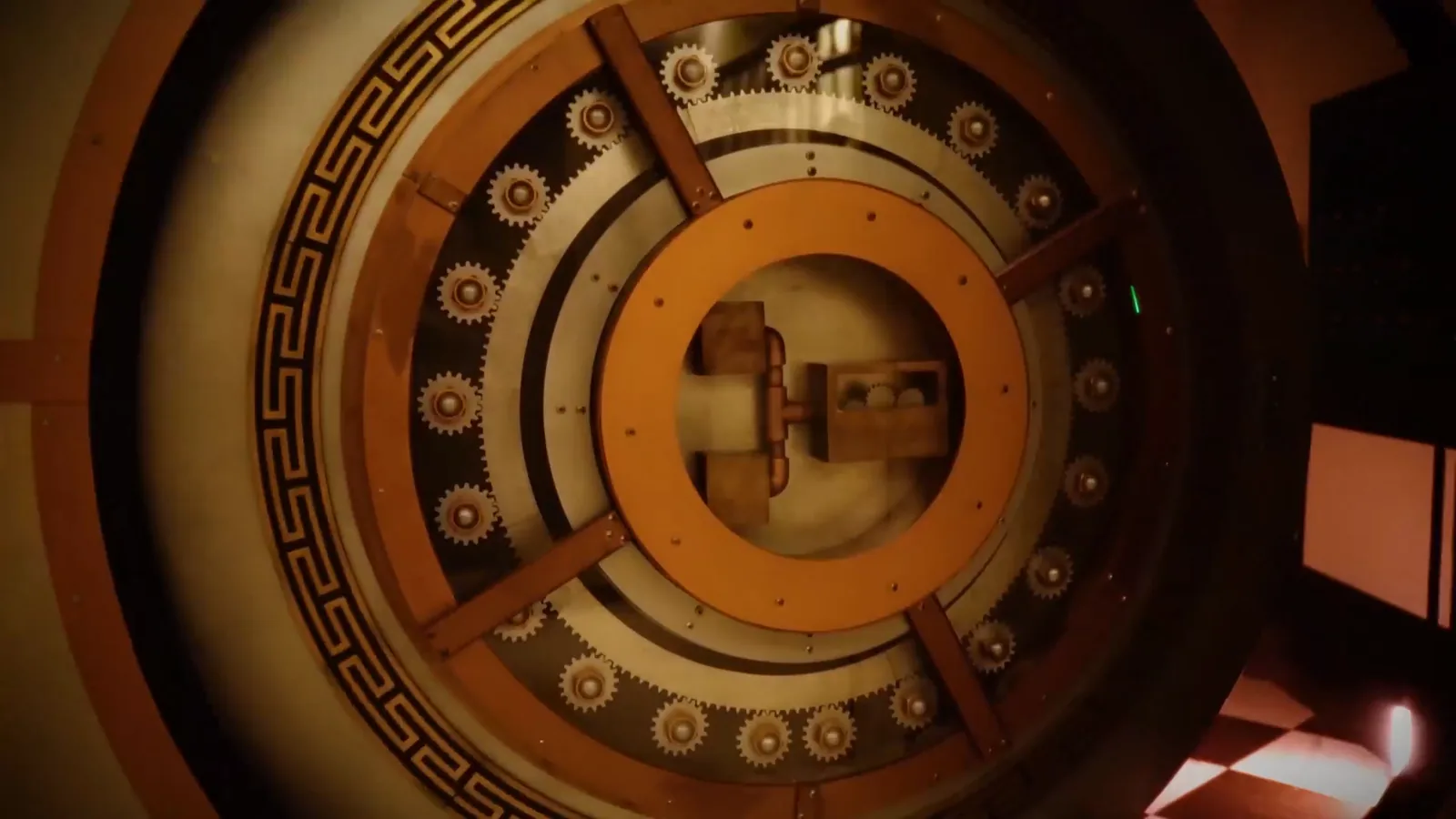 The brass and gold locking mechanism of the Bank Heist vault door